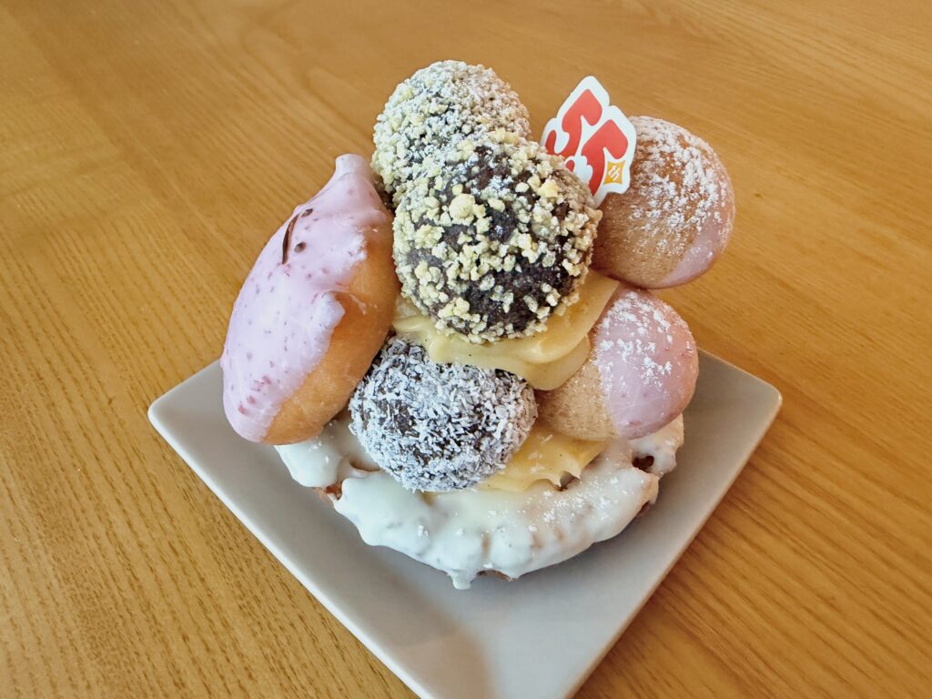 Angled front view of the Ditto Donut Tree from Mister Donut with layered donuts and pops