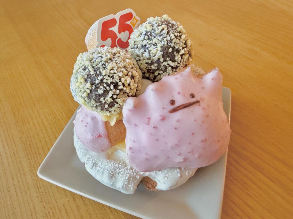 Angled side view of the Ditto Donut Tree with pink Ditto topping and chocolate pops